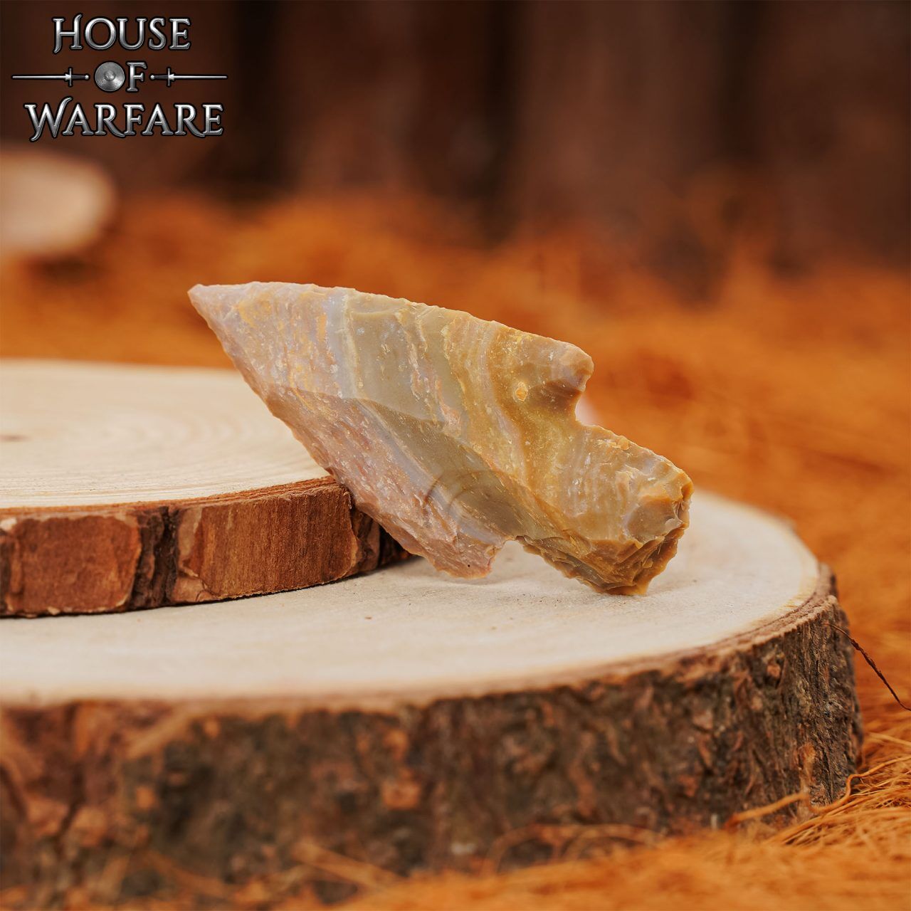 701814_3 Small Stone Stemmed Arrowhead in Brown Flint 6cm